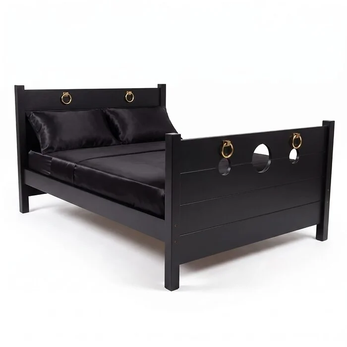 The Sovereign Bed in Onyx Black, studio view of the headboard and footboard with gold-tone rings